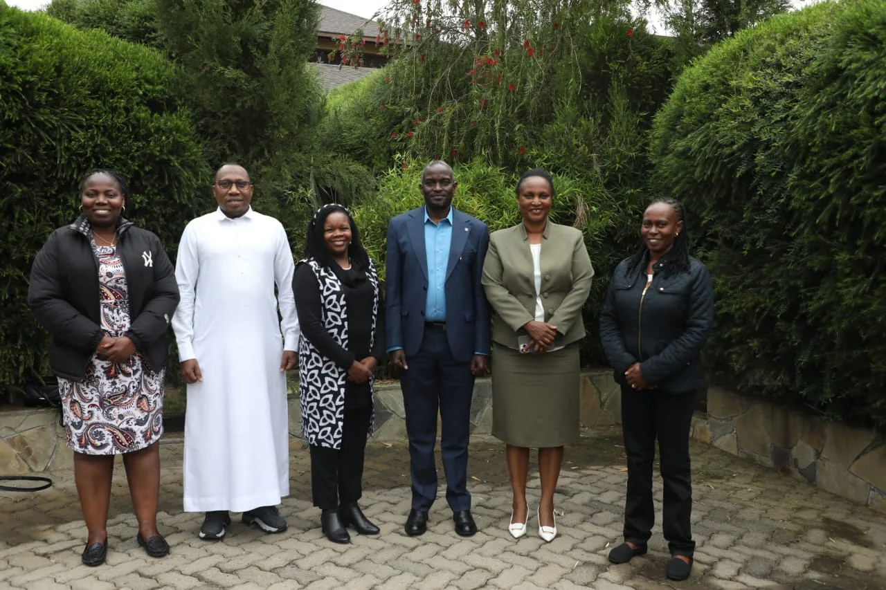 Assistant Registrars, the current Registrar and former Registrars pose for a photo during the induction exercise of the newly appointed Registrar of Political Parties, John Cox Lorionokou and Assistant Registrar, Agatha Wahome Assistant Registrars, the current Registrar and former Registrars pose for a photo during the induction exercise of the newly appointed Registrar of Political Parties, John Cox Lorionokou and Assistant Registrar, Agatha Wahome